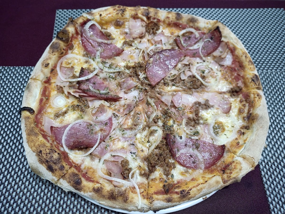 Restaurante Pizzería + Que Pizza