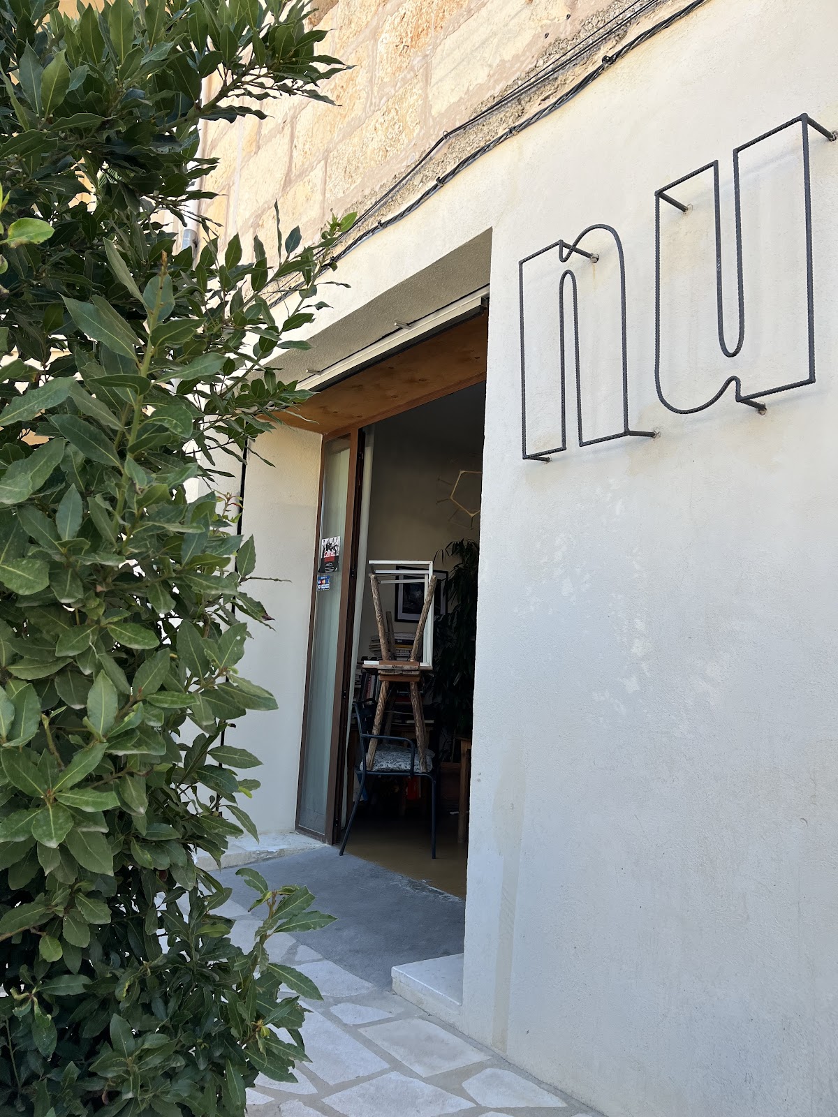 NU